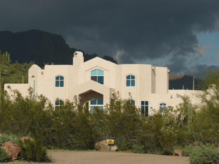 Modern house surrounded by desert landscape In Arizona